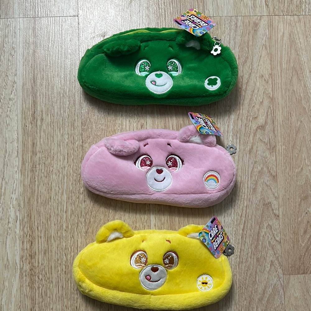 Care Bears Green, Pink, and Yellow Plush Cases